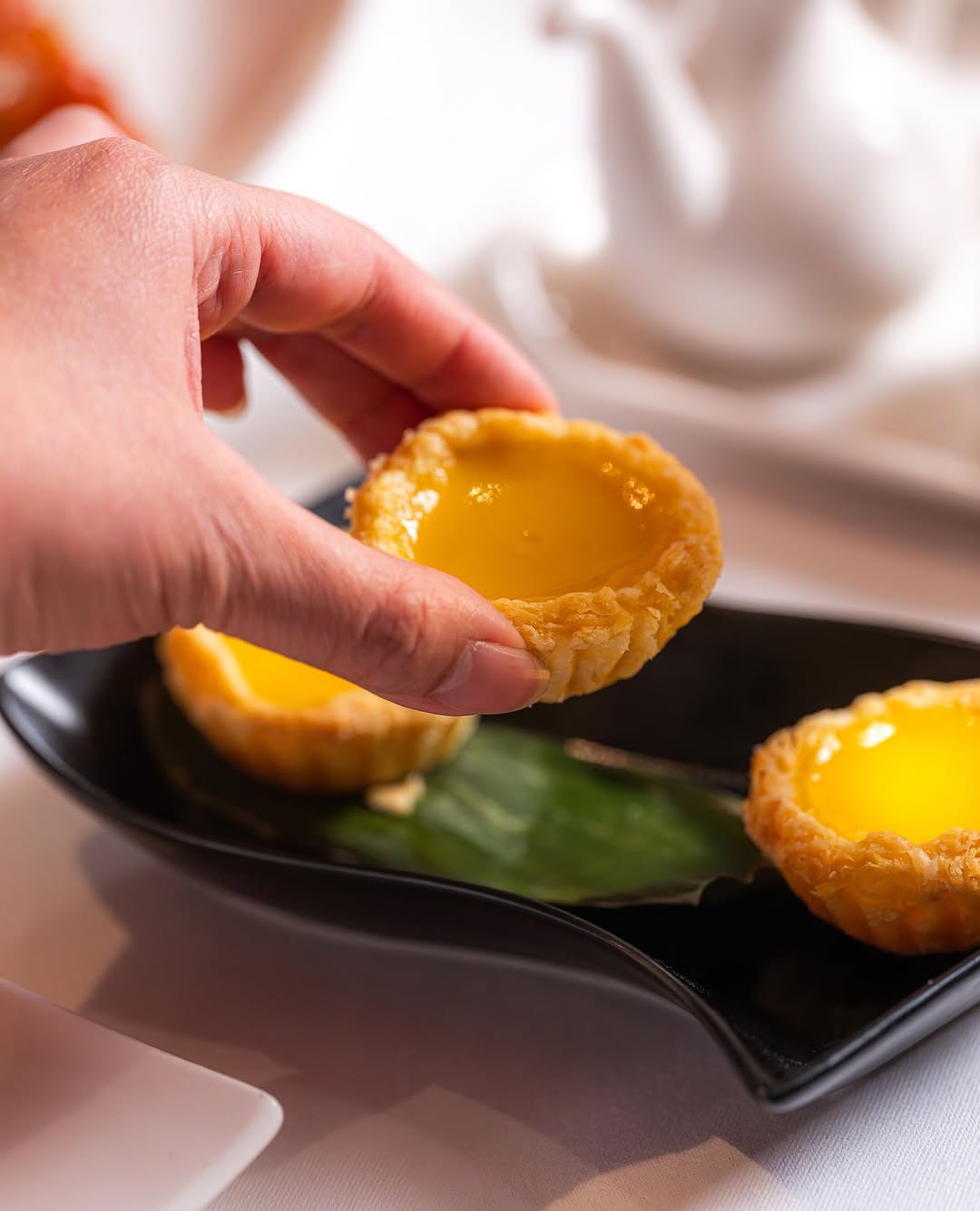Flaky, buttery pastry meets a silken, warm egg custard 🥧✨⁠
⁠
Have you tried our Baked Egg Custard T