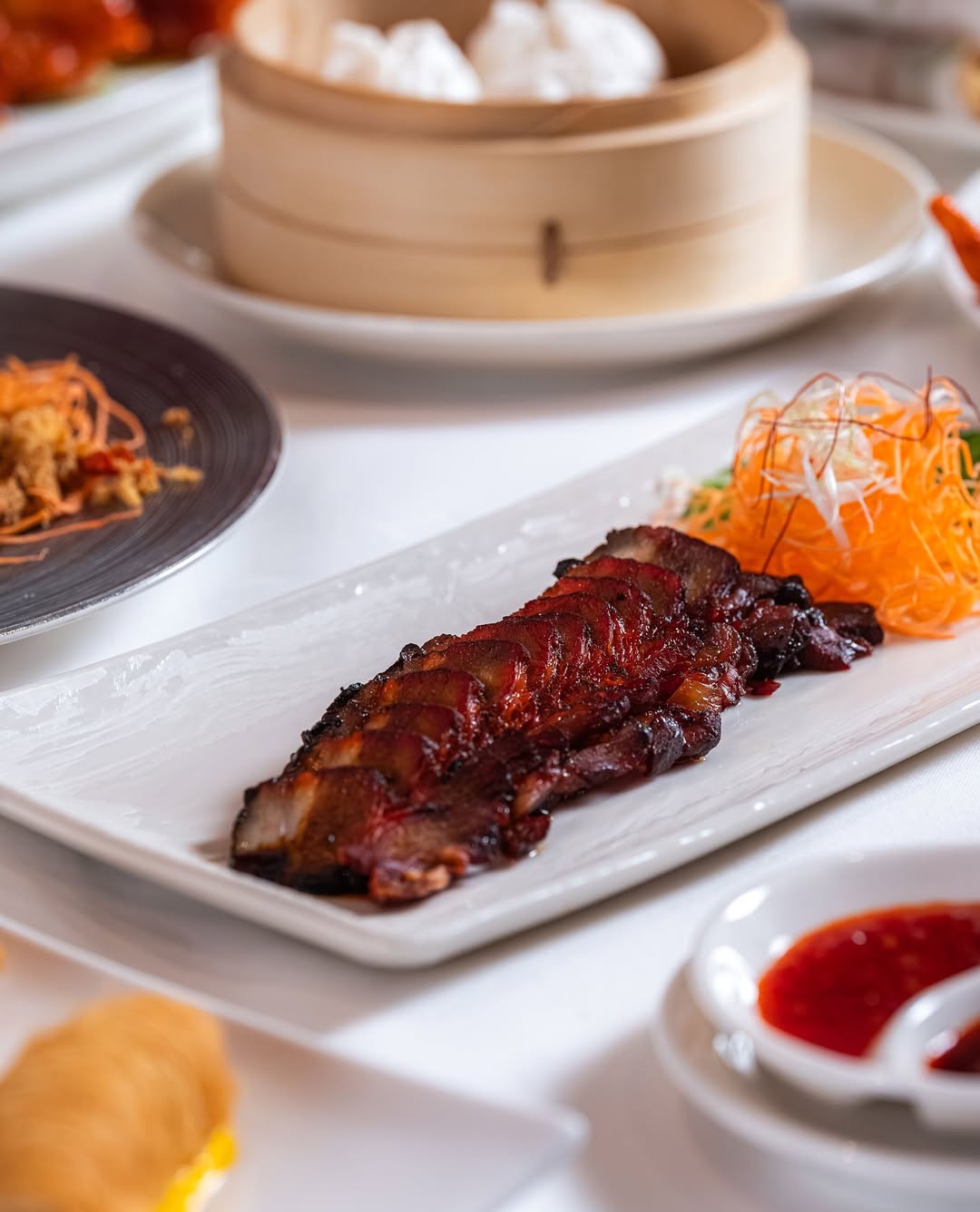 Perfection on a plate: Min Jiang’s legendary Roasted Sweet Barbeque Pork 🌟⁠
⁠
#pork #authenticchine