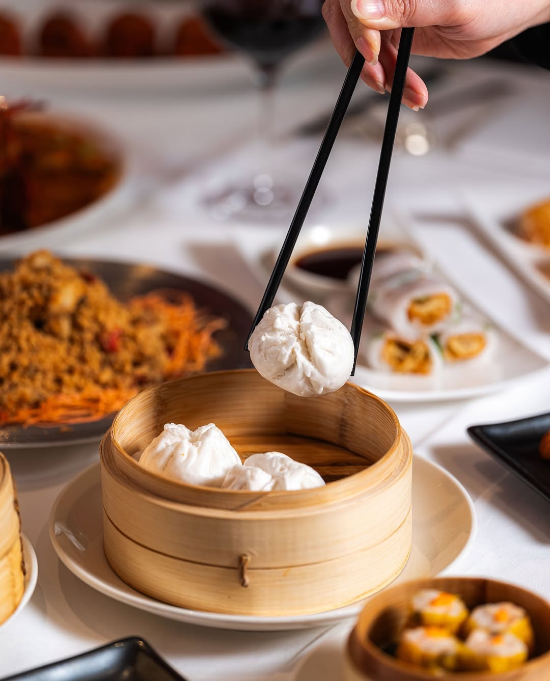 The perfect bite 😋⁠
⁠
Our signature steamed Min Jiang Char Siew Pork Bun 🥟⁠
⁠
#pork #authenticchin