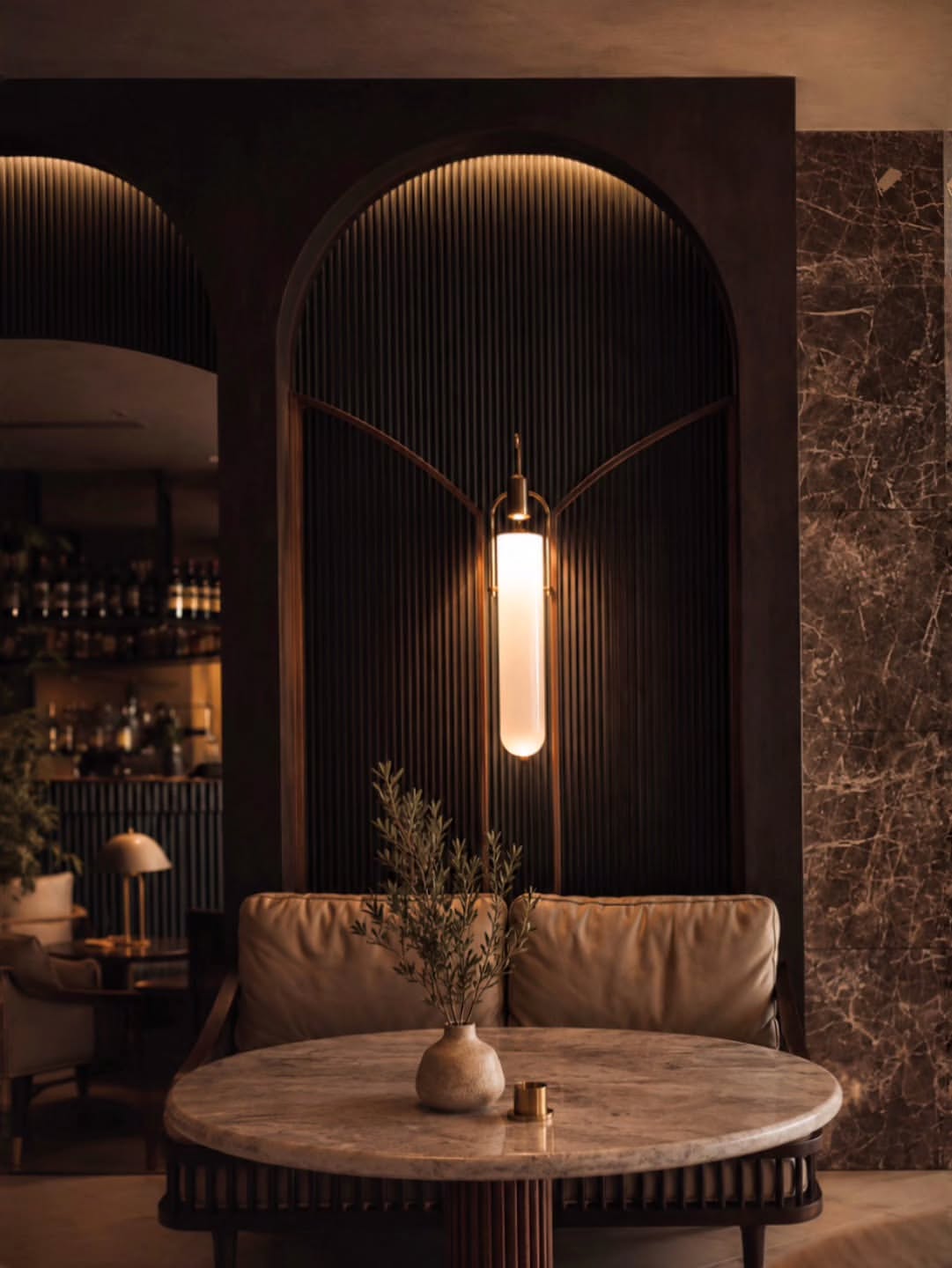 A relaxed yet refined gathering space at the Mondrian South Beach, where natural rattan details, Ita